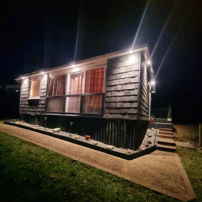 Cosy Hideaway Lodge In Glan Gwna Caeathro Bagian luar foto
